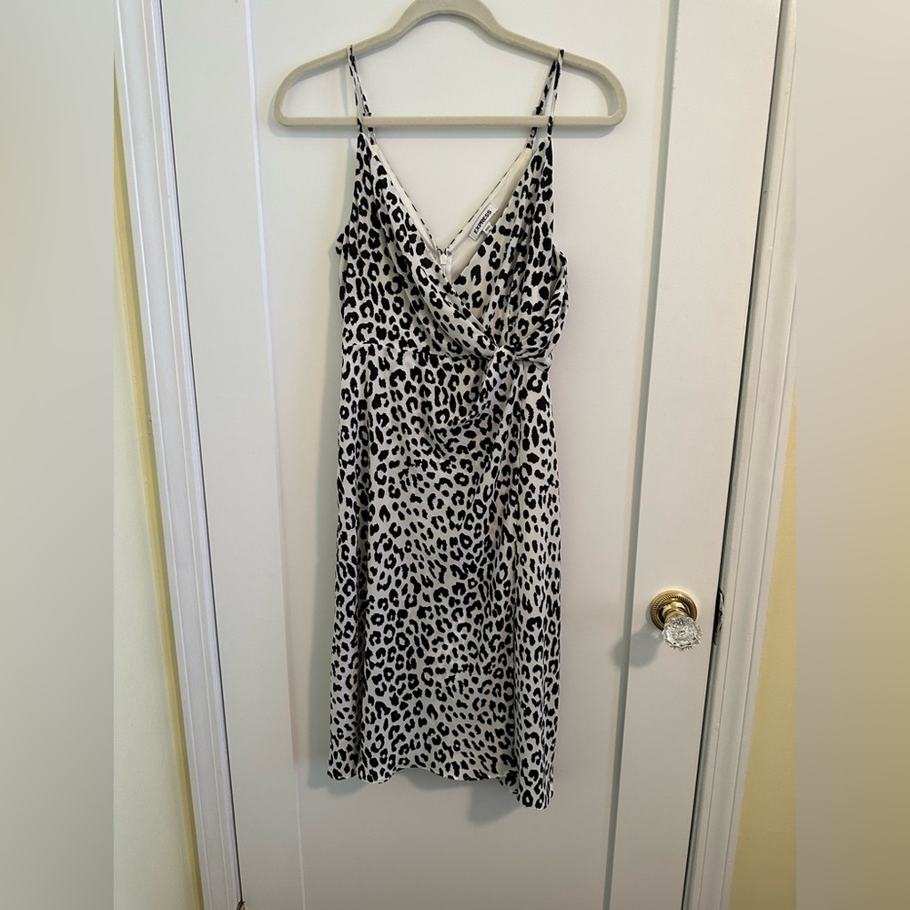 Express spaghetti strap dress. Size: XS Color: Leopard print, black & white